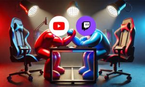 Imagen de dos muñecos redondeados están echando un pulso sobre una mesa de gamer e iluminados por focos. Un muñeco es de color rojo y su cabeza es un círculo blanco con el icono de YouTube, y el otro es azul y su cabeza es un círculo morado con el logo de Twitch